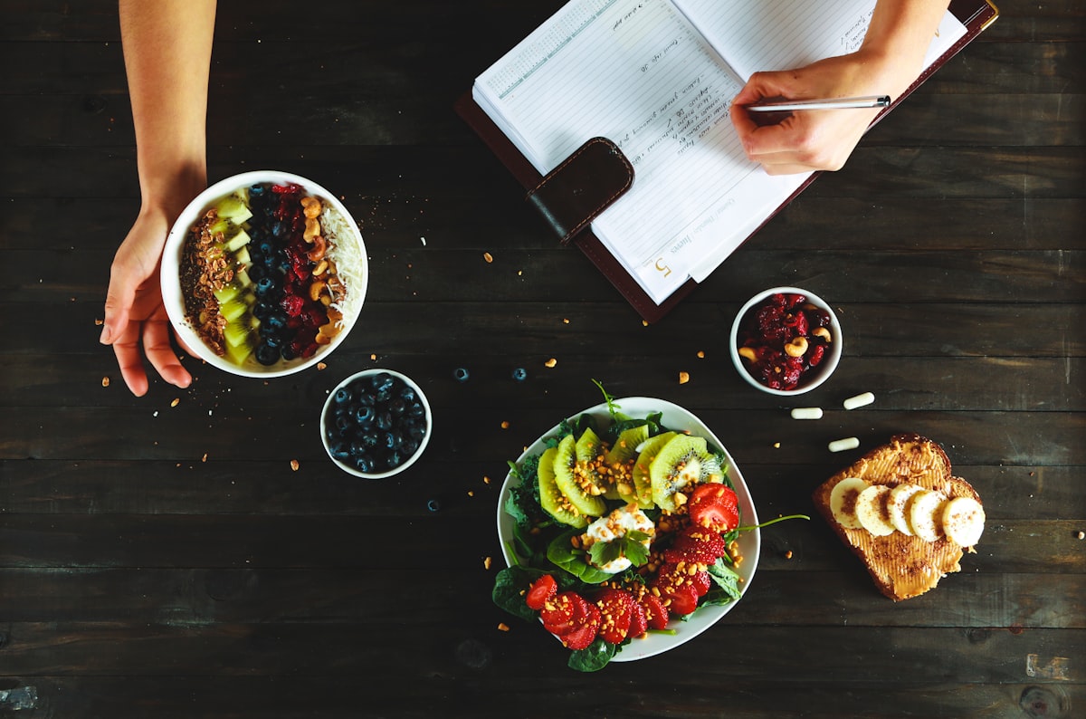 Nutritionist reviewing personalized meal plans with client